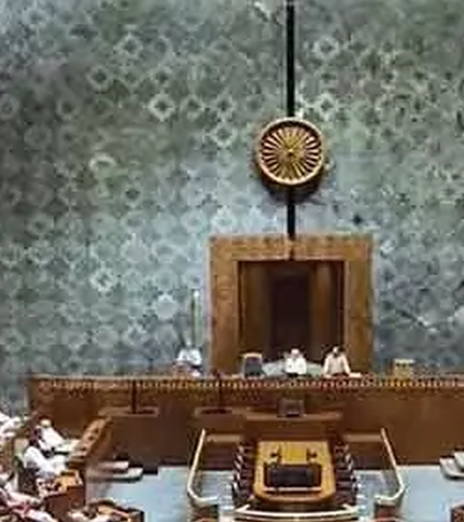 Indian Parliament chamber with large display screens
